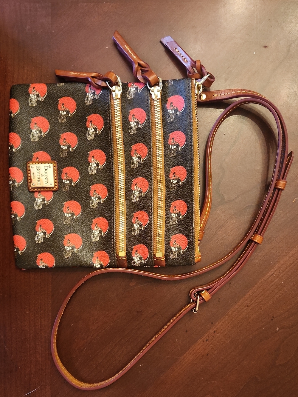 Dooney & Bourke Black Crossbody with Red Print and Brown Leather Trim